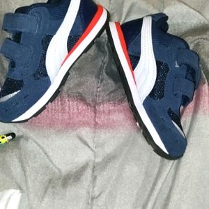 Puma kid size t8 blue red an white